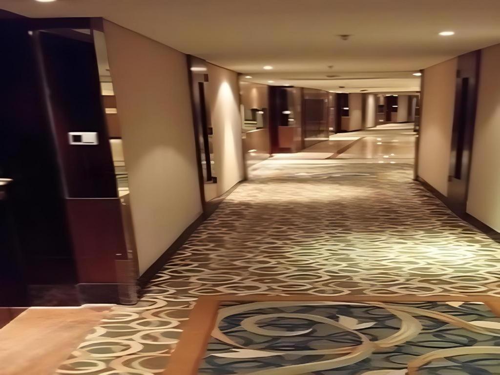 New Century Grand Hotel Xuzhou Bagian luar foto