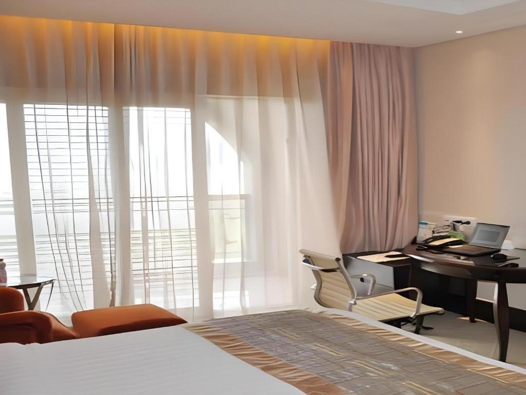 New Century Grand Hotel Xuzhou Bagian luar foto